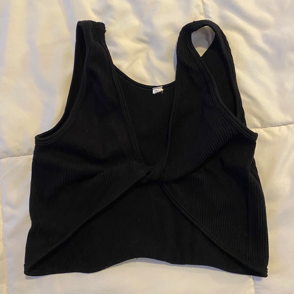 Twist front tank. Can be worn forwards or backwards!